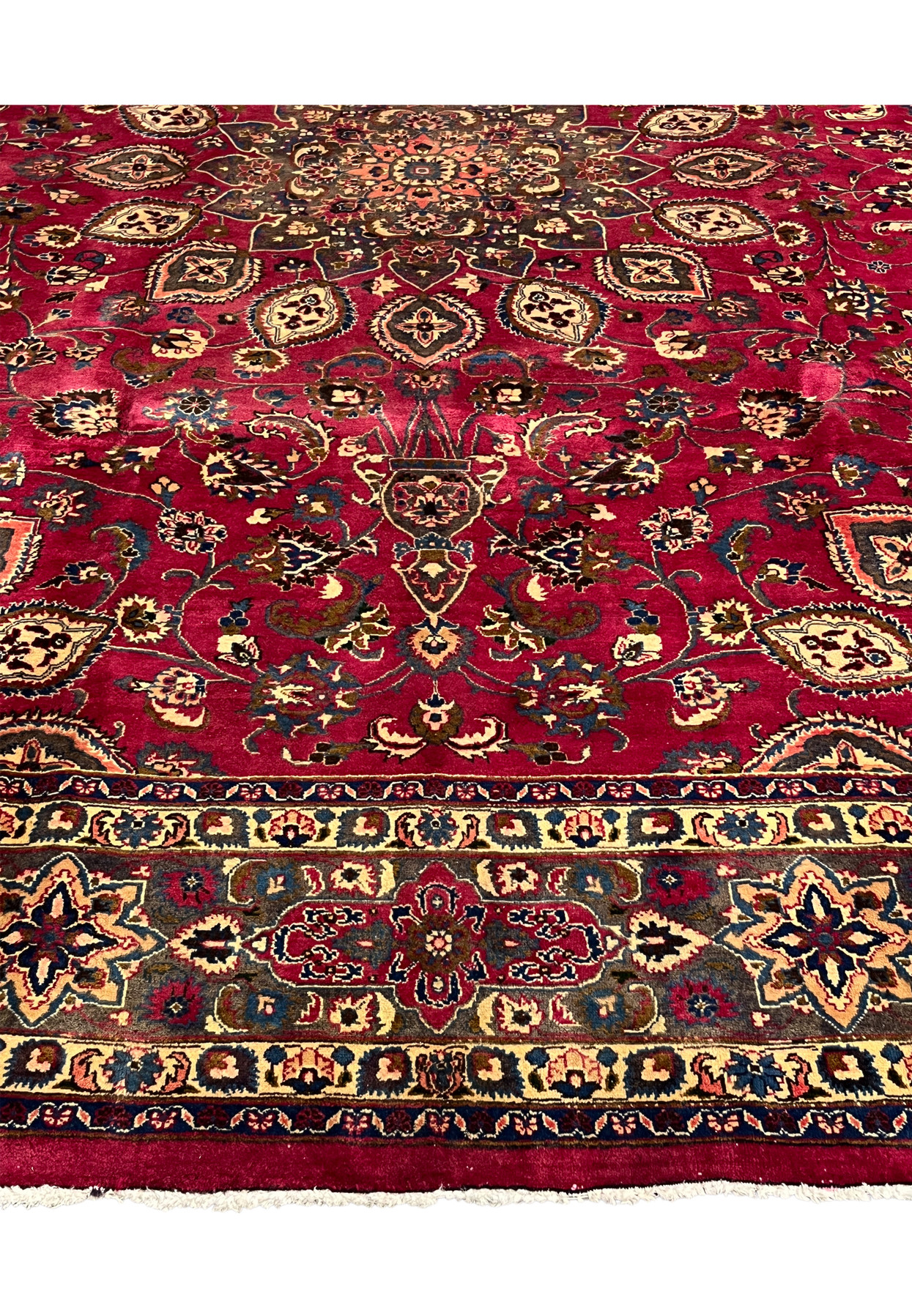 Lower field and grey border of the Persian Mashad with star rosettes and floral palmettes