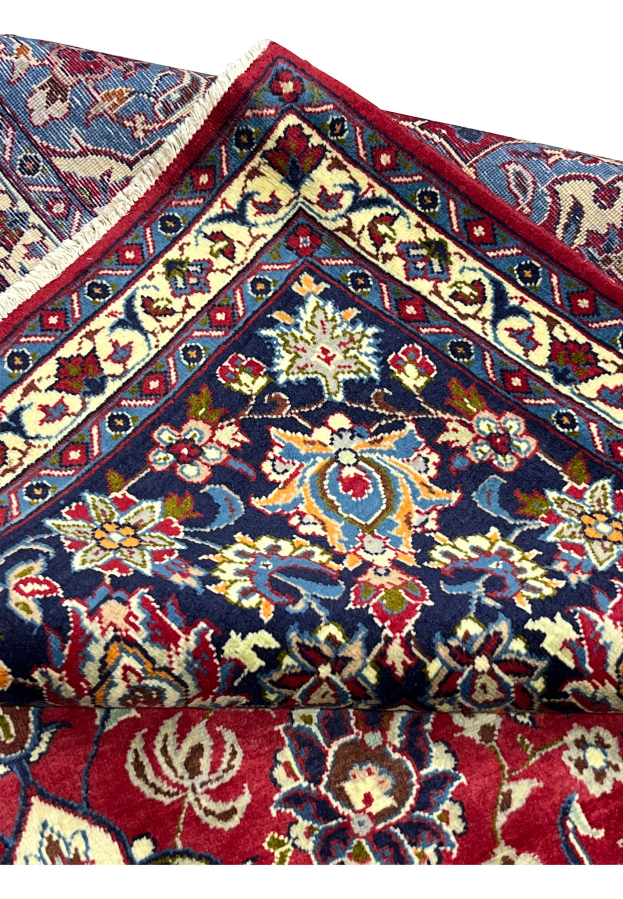 Folded edge showing the bound selvage and tight foundation of this authentic handmade Persian carpet