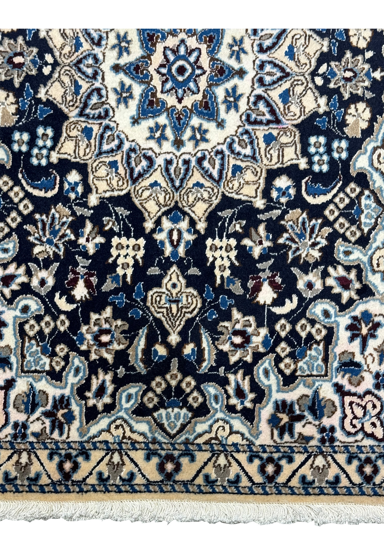 Navy field of delicate floral sprays meeting the ivory border, ideal as an entryway accent rug