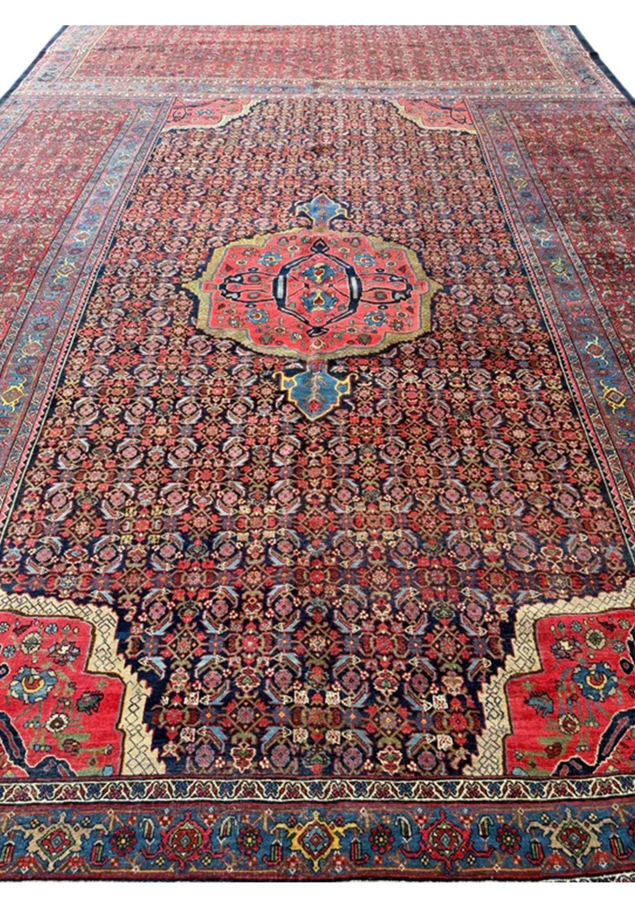 13x20 antique Persian Bijar viewed lengthwise with its rose medallion and dense allover field