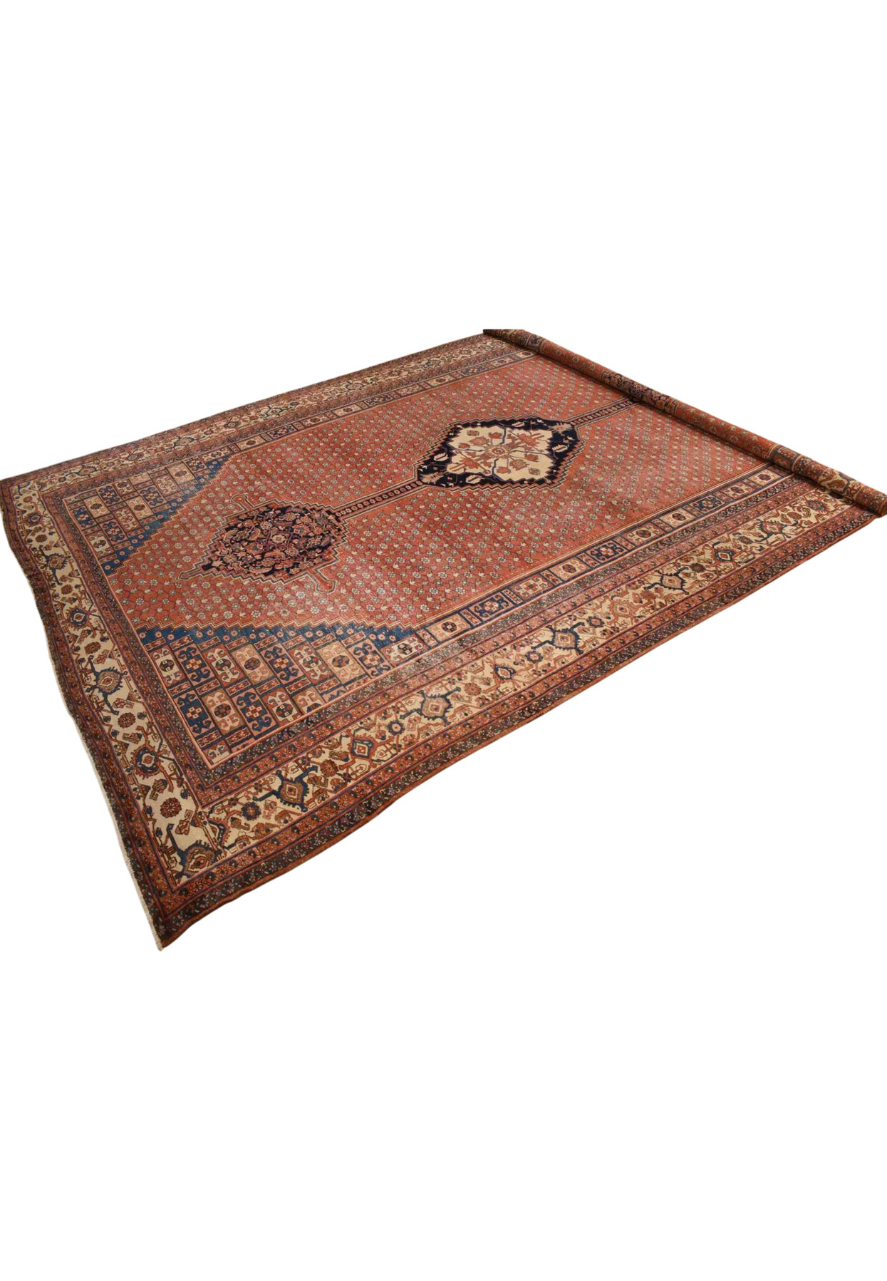Angled view of dark coral Bakshaish with ivory hooked border and stepped blue spandrels