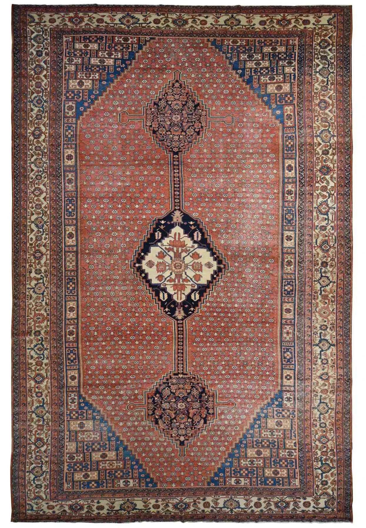 Palace size antique Persian Bakshaish rug circa 1900 with anchored medallion on dark coral field