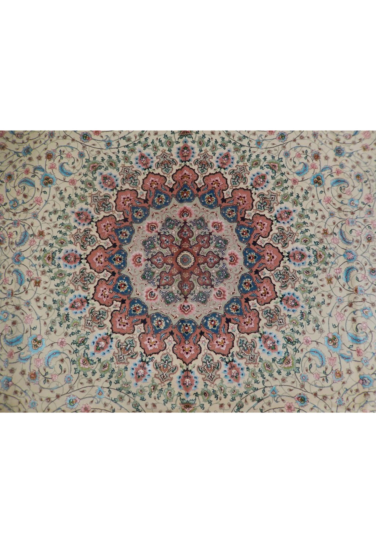 Layered salmon pink and teal medallion detail with silk highlights radiating over swirling vines