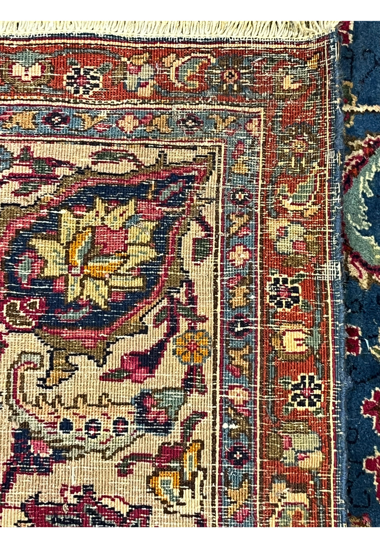 Backside weave view revealing hand knotted construction and true colors of signed Mashad
