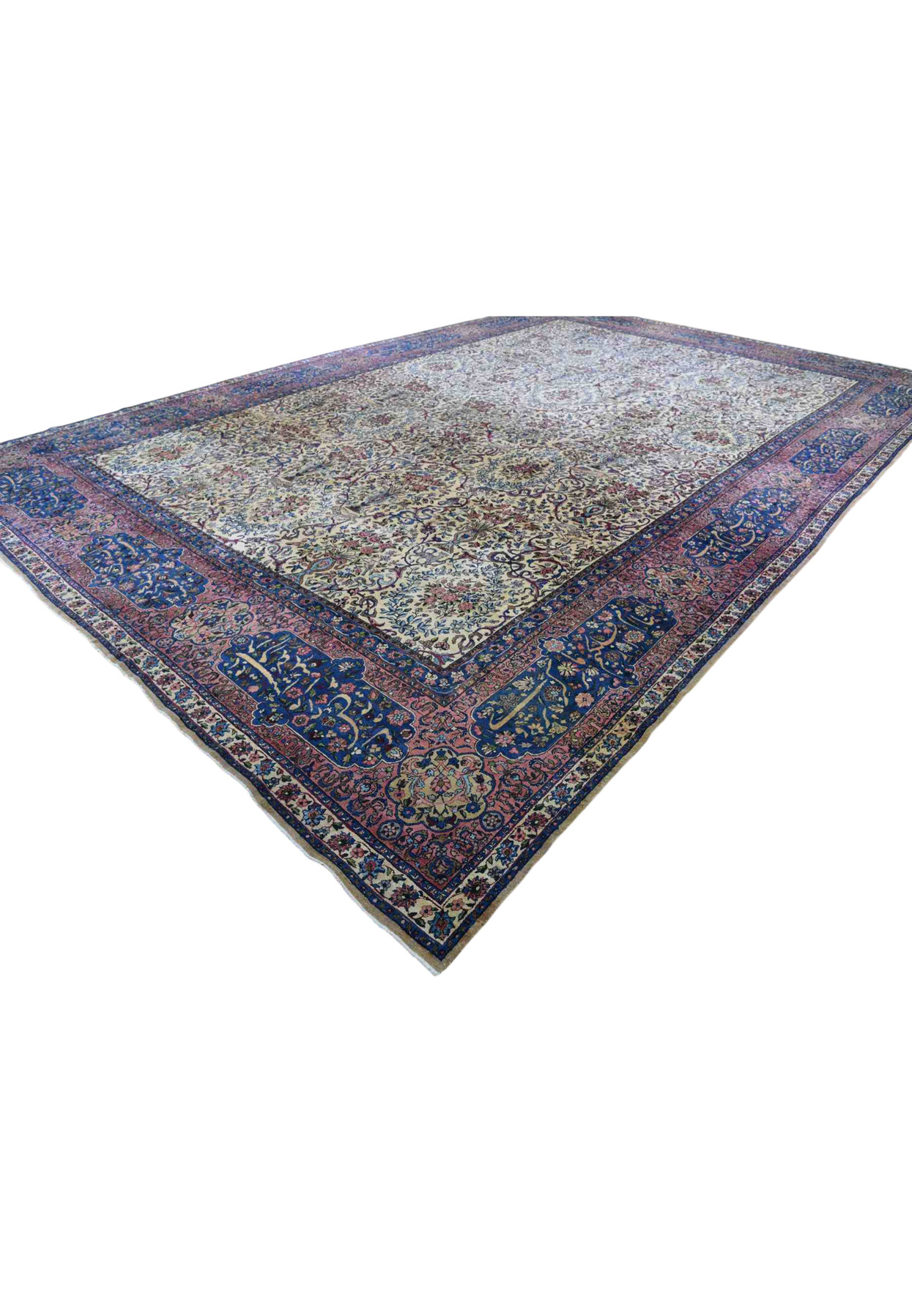 Angled view of ivory antique Kerman with sanguine red border and navy poetry cartouches