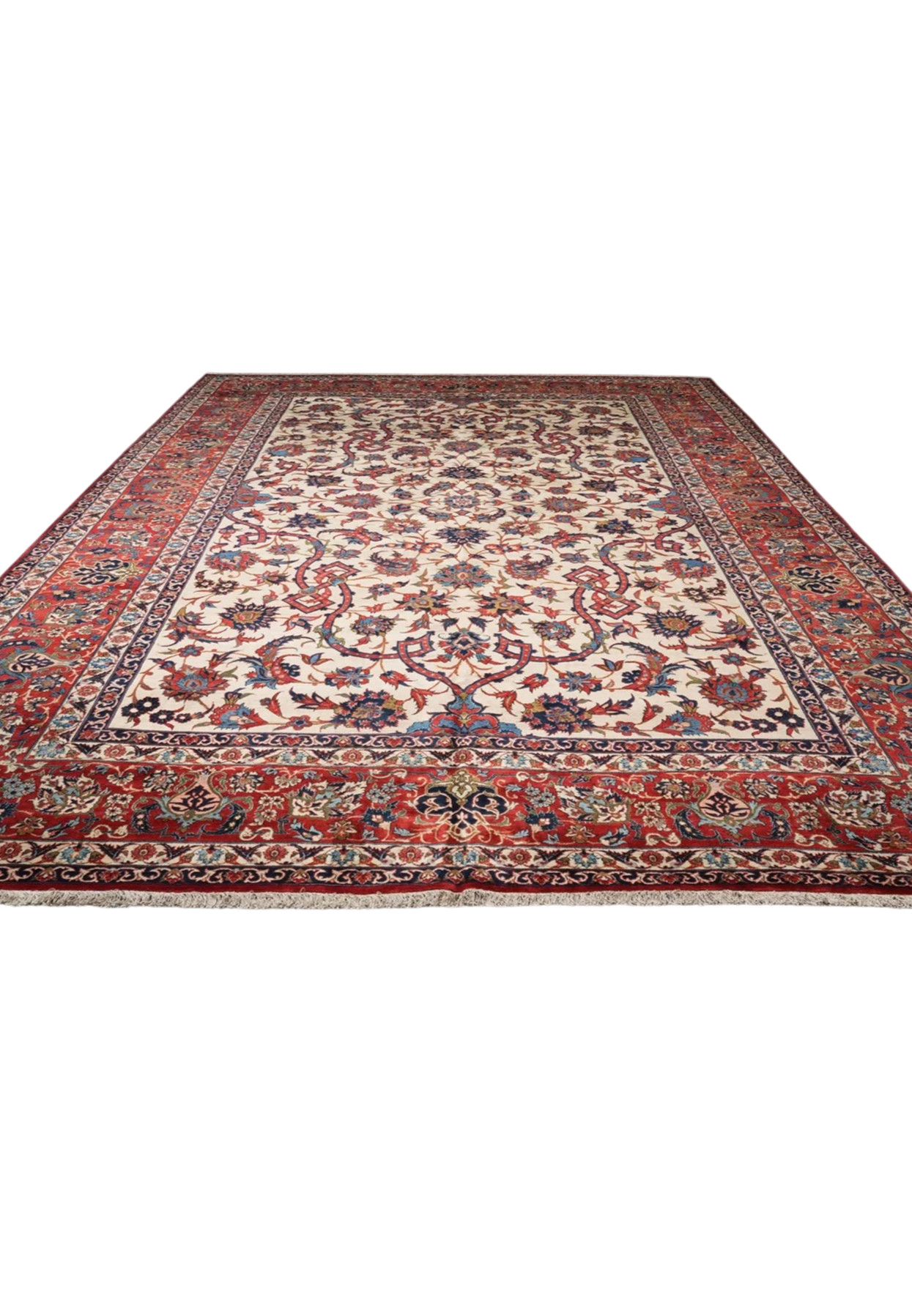 1970s Persian Isfahan laid flat, showing the full ivory field and seven band border