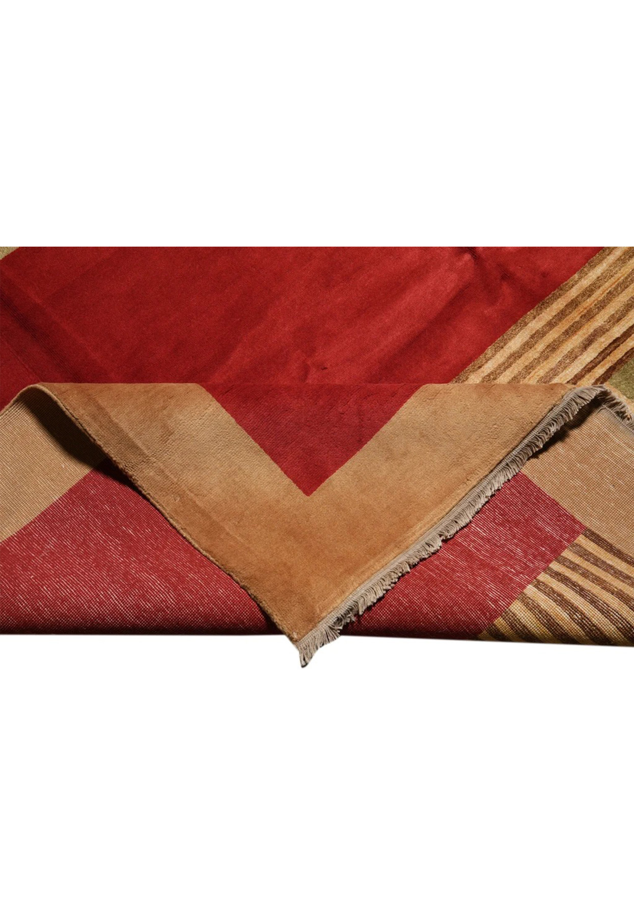 Folded corner revealing the cotton foundation beside the camel border front