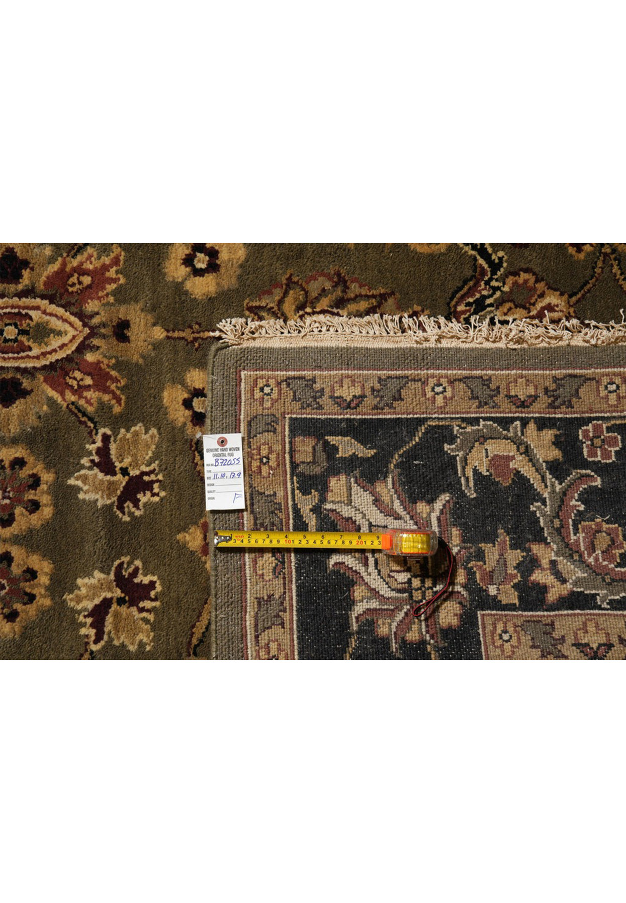 12x18 Oushak rug reverse with tape measure and tag confirming the palace dimensions