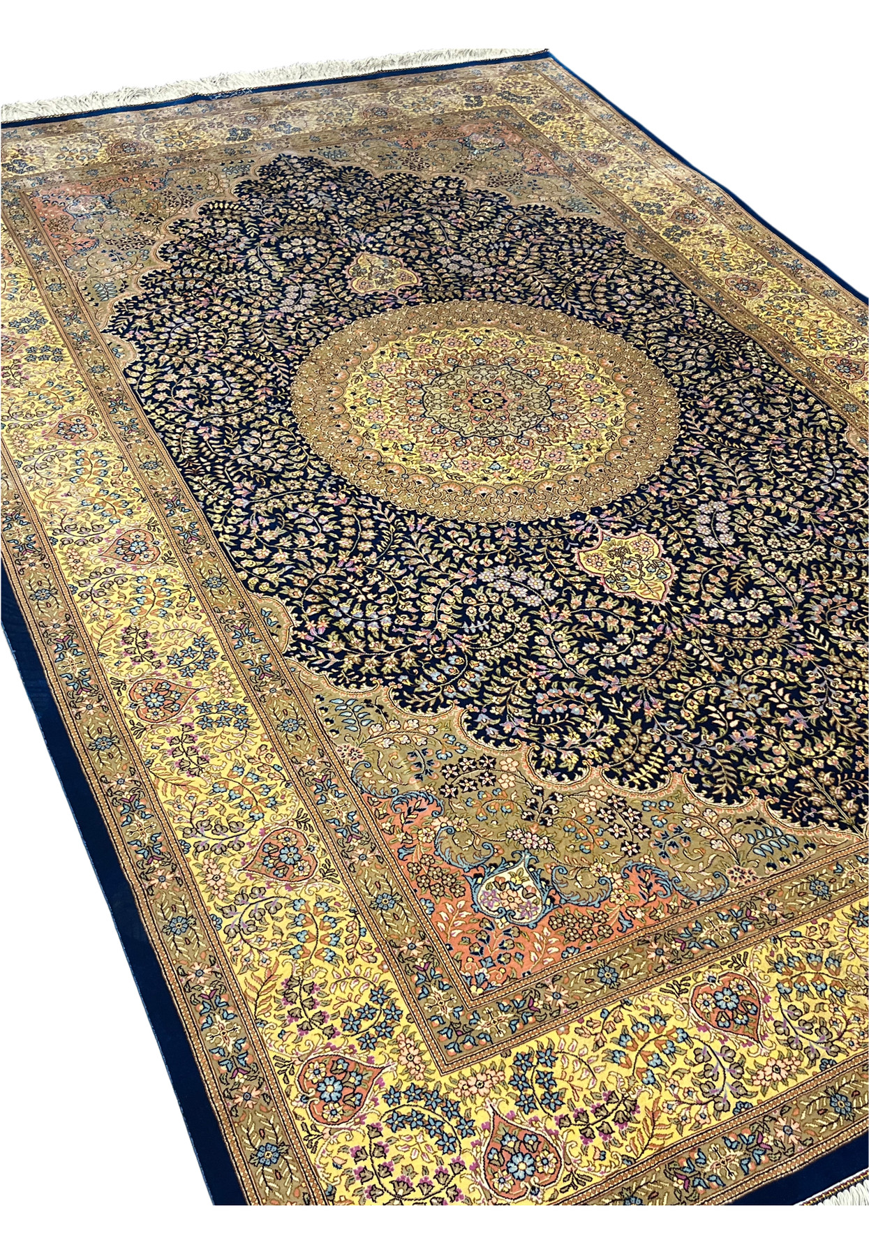 Angled view showing the silk sheen shifting across the navy field and yellow gold border