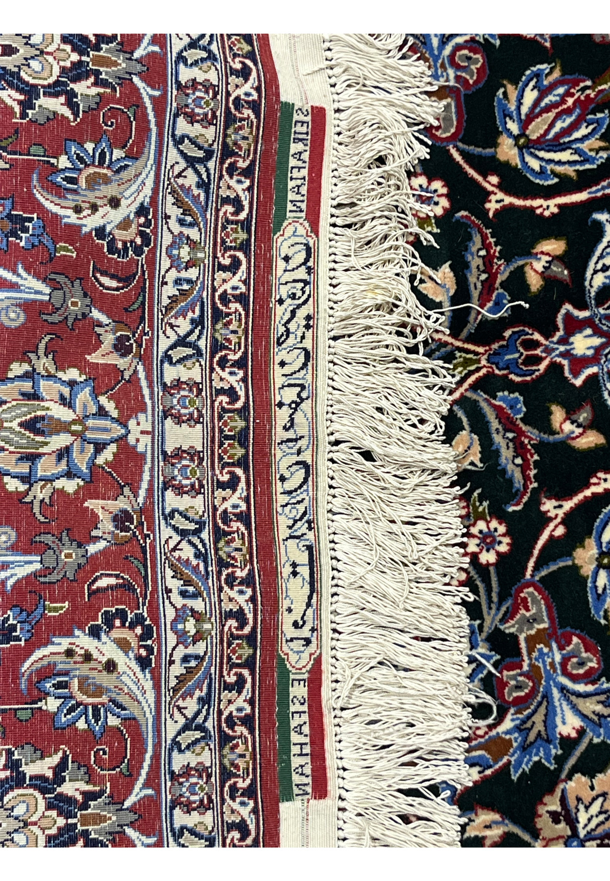 Reverse of the signature panel showing the workshop name and clean silk warp ends