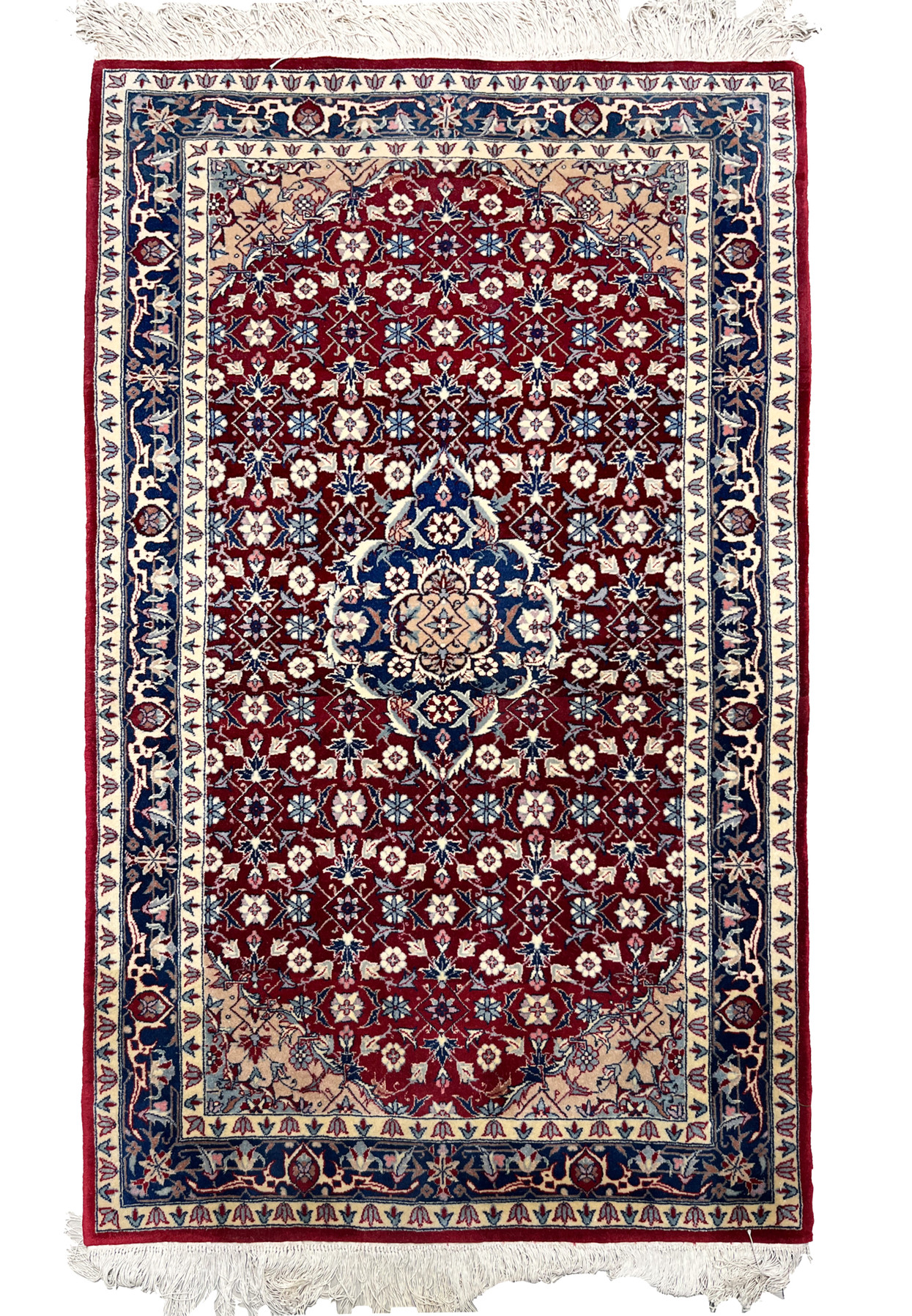Full view of a 3 x 5 Persian Tabriz rug with central floral medallion, deep ruby red field, navy blue accents, ivory borders, and refined symmetry