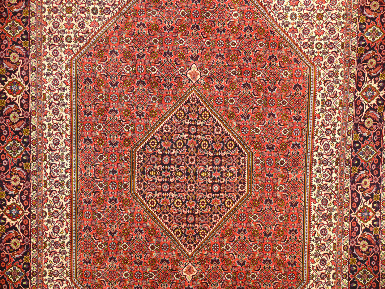 Close-up of the intricate designs and color mix on the Persian Bijar Iron Rug.