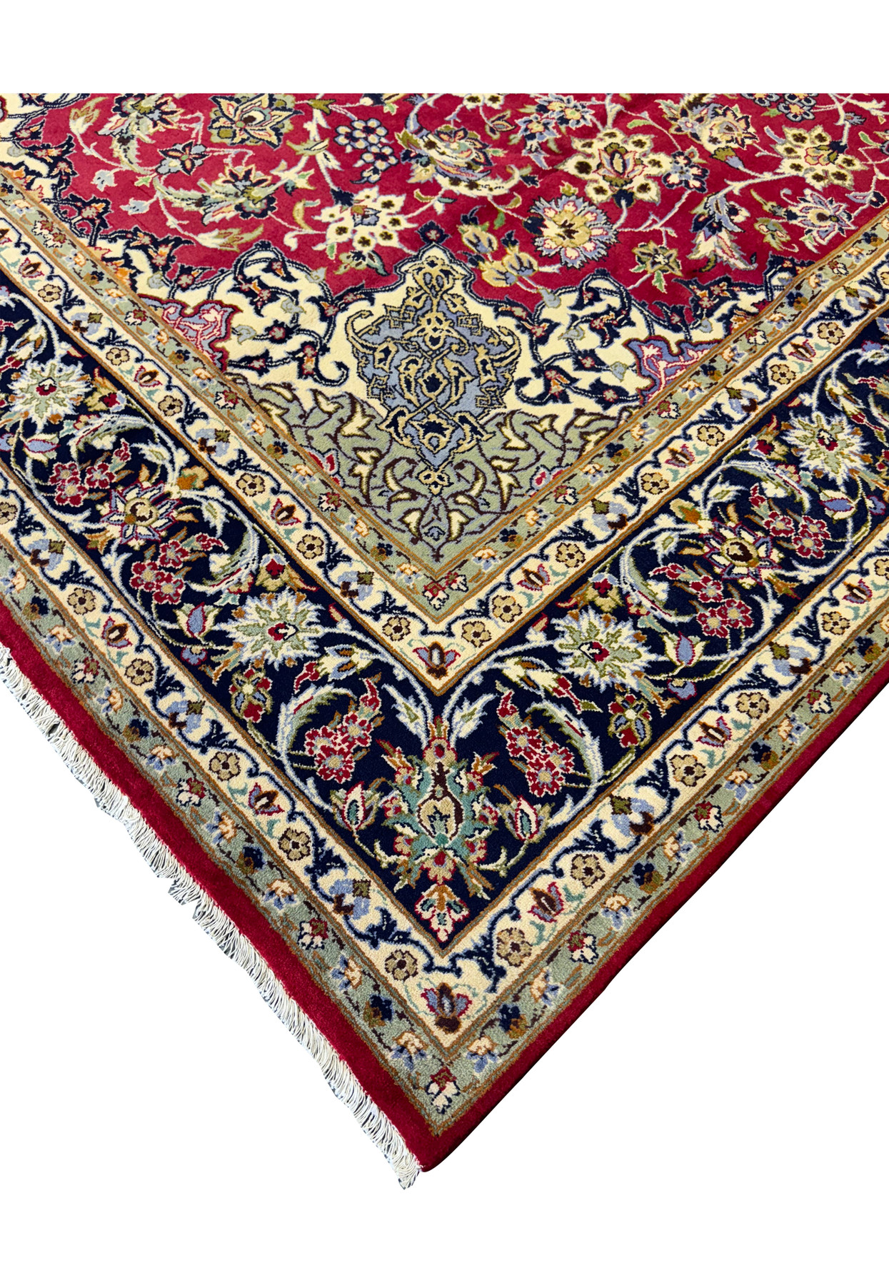 Edge detail of Persian Isfahan Rug displaying the luxurious wool pile and cotton foundation.