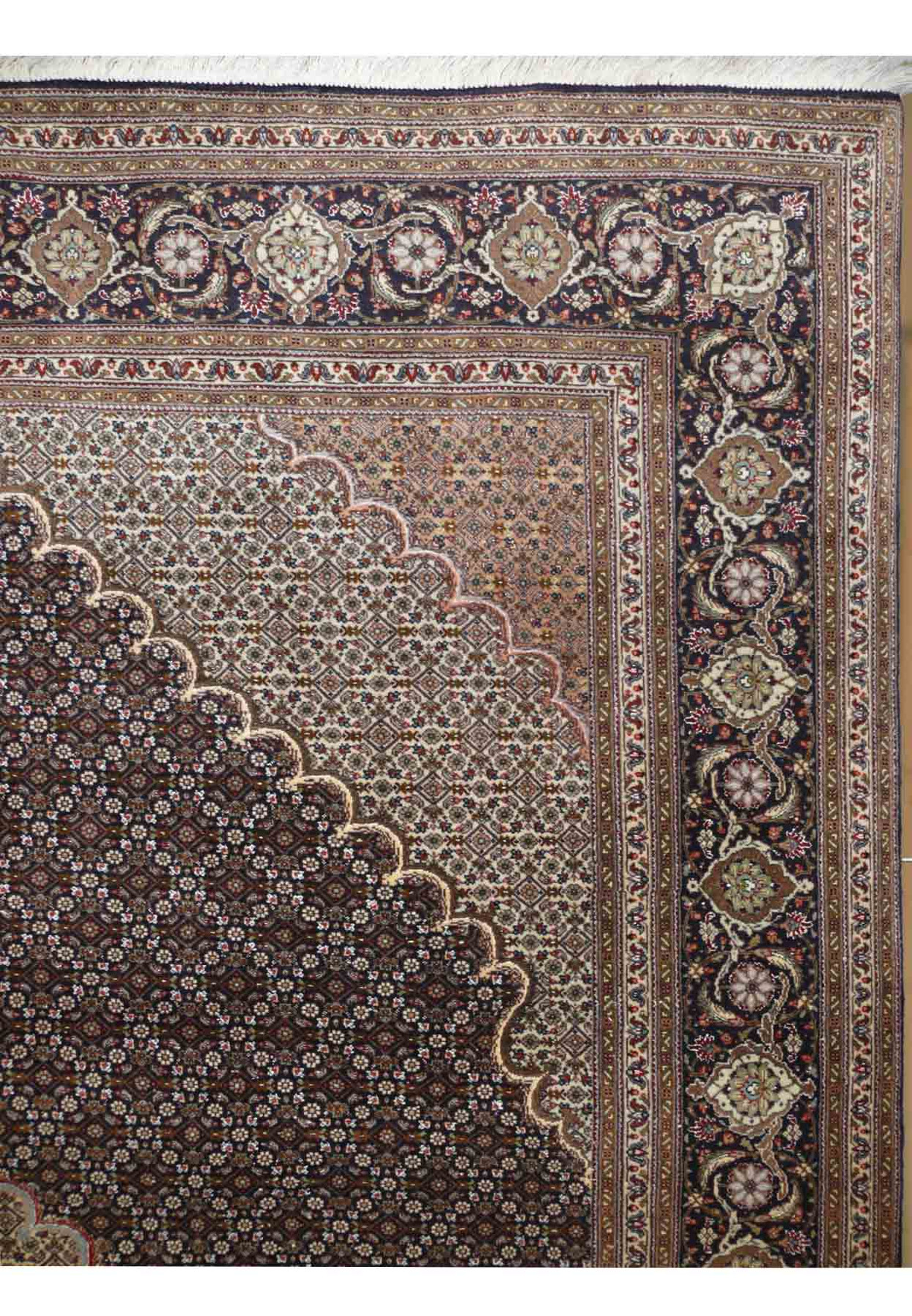 Detailed view of the elaborate border pattern on the 7' x 10' Persian Tabriz Mahi Rug