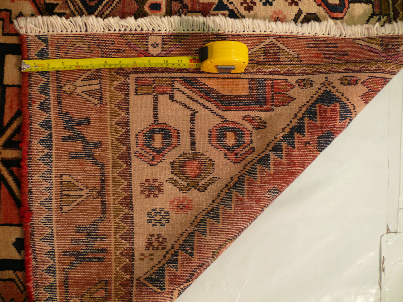 Back view of the 3'4 x 5'2 Antique Persian Khamseh rug showing the quality of the weave