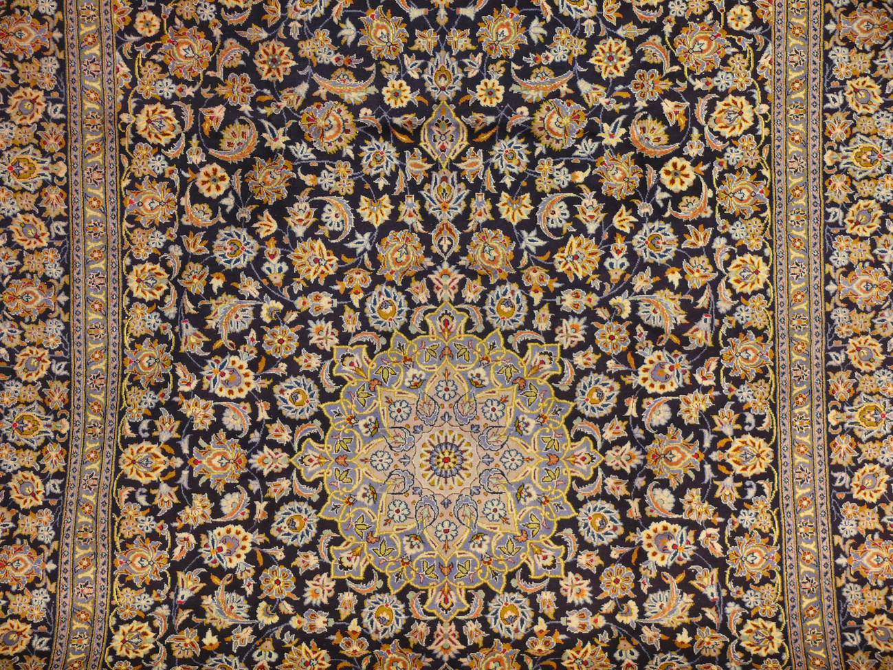Centerpiece Detail - Persian Kashan Rug Medallion: Explore the intricacies of the central medallion on this 9'7 x 13'9 Persian Kashan Rug, featuring delicate floral motifs and exquisite craftsmanship