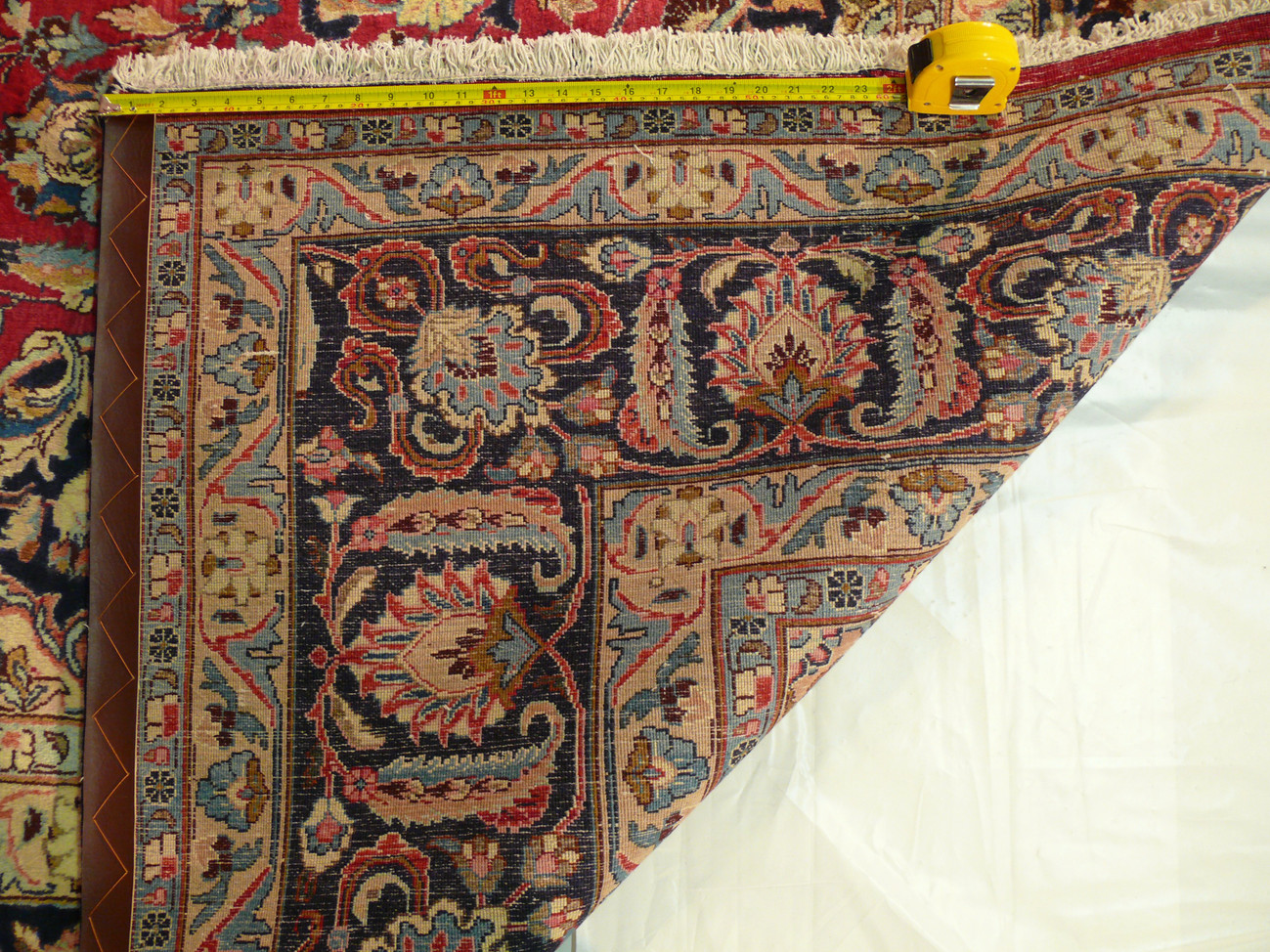 Fringe details on 9'8 x 14'8 Persian Kashan Rug