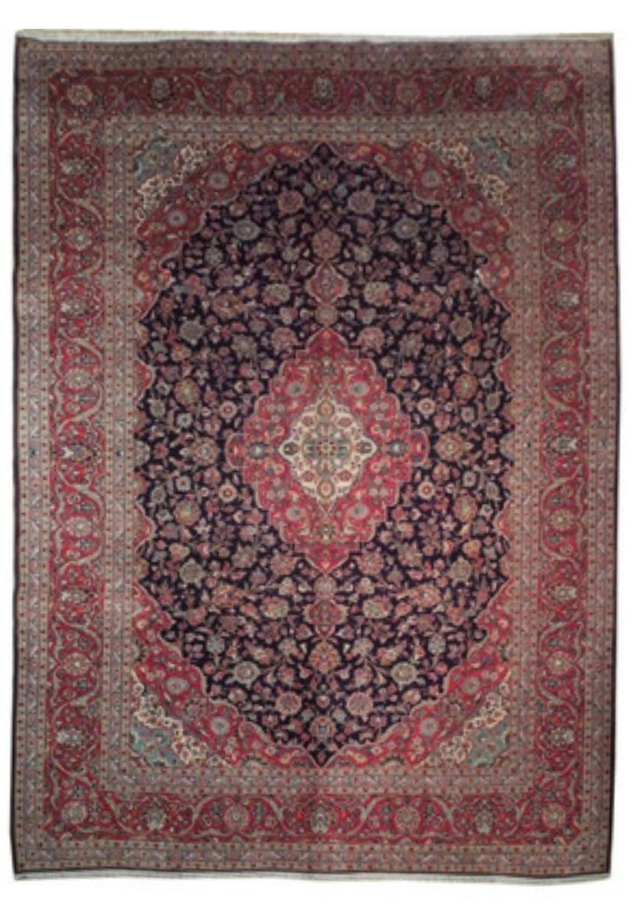 Authentic Handmade Persian Kashan rug with a detailed central medallion in red and blue floral motifs on a luxurious wool fabric, size 10x13.5 feet.