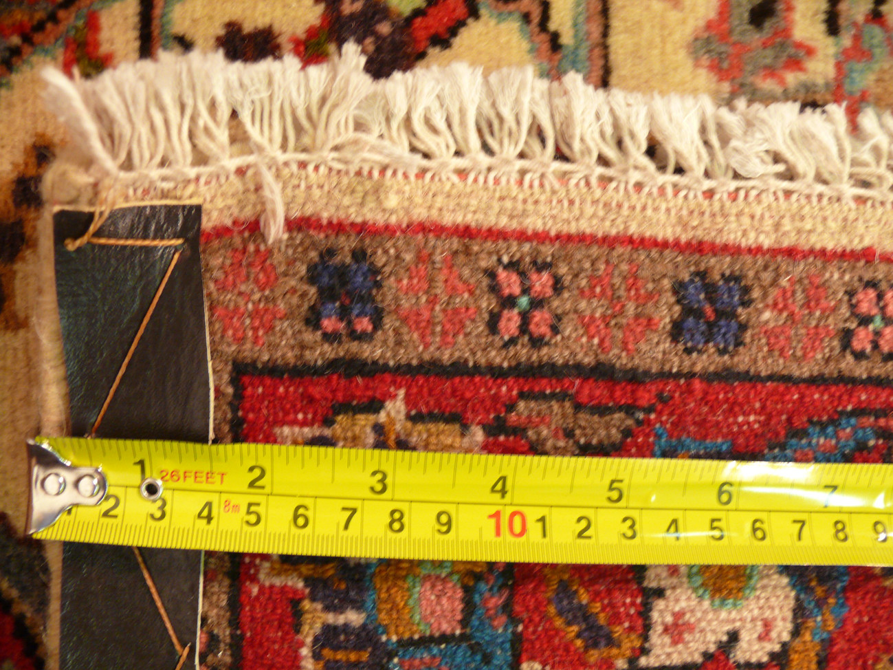 Texture of the handwoven wool on the 3'5 x 4'10 Persian Koliai rug