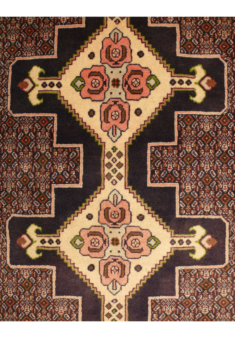 A traditional Persian Senneh runner with a central medallion design in vibrant hues of red, blue, and gold, placed in a living room.