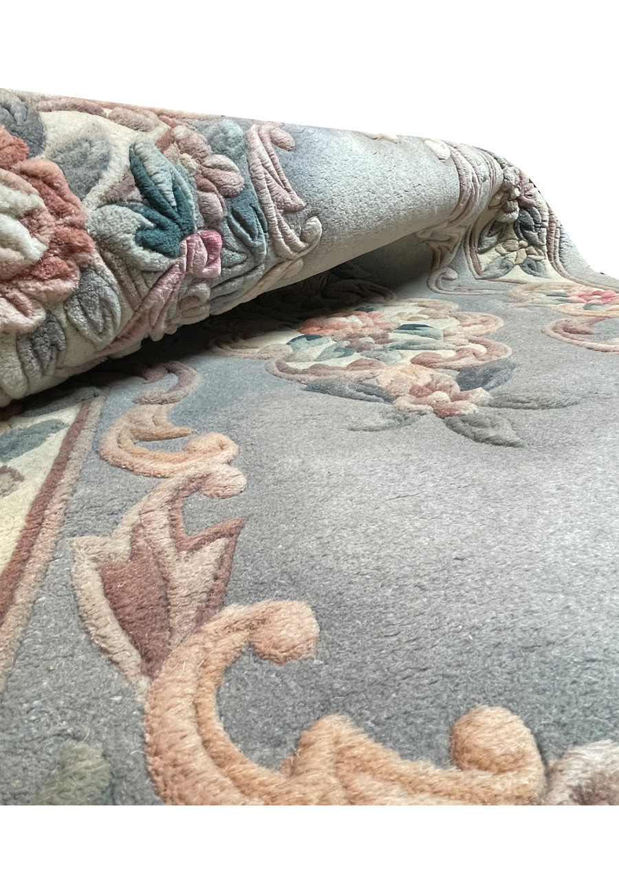 vegetable dyed colors and organic thick wool of a 3x5 art deco rug