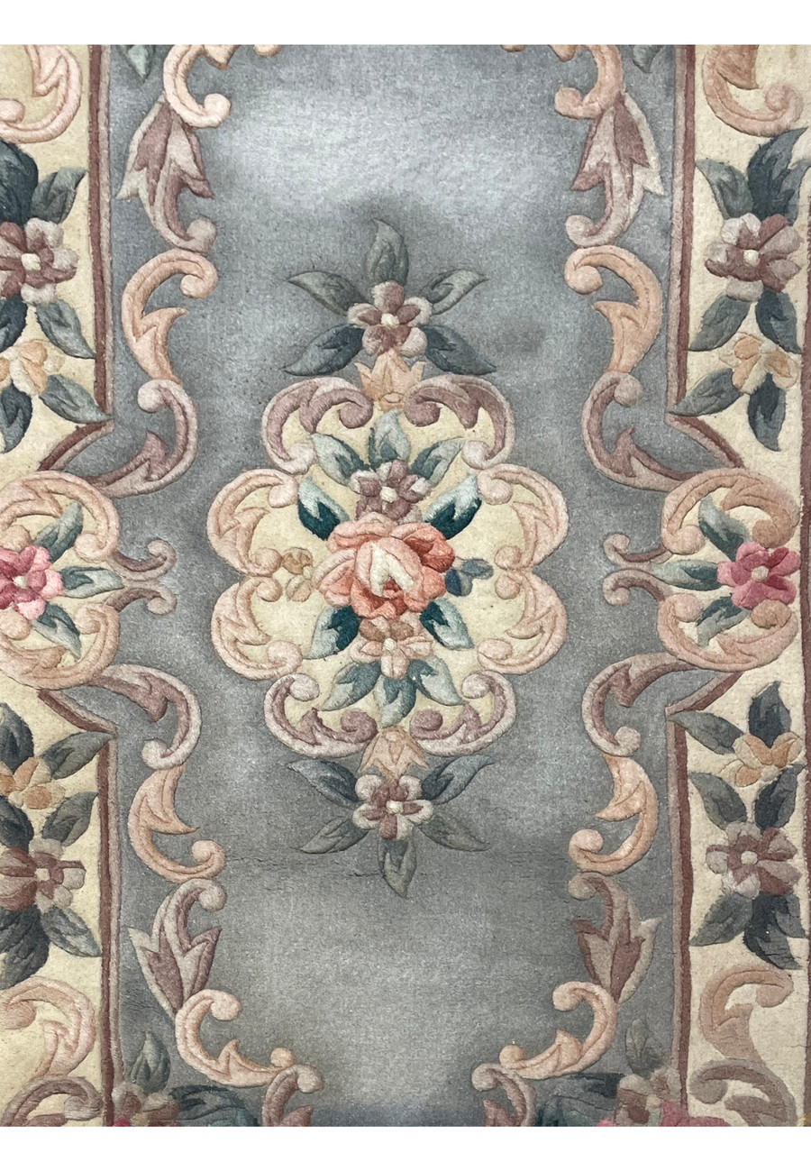 art deco rug showing the medallion and beautiful floral pattern