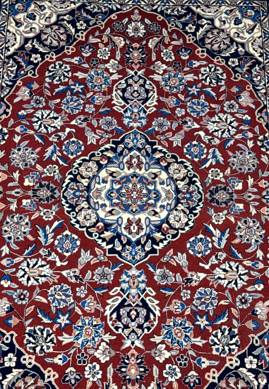 Detailed view of 4x6 Persian Isfahan rug showcasing intricate floral patterns and central medallion