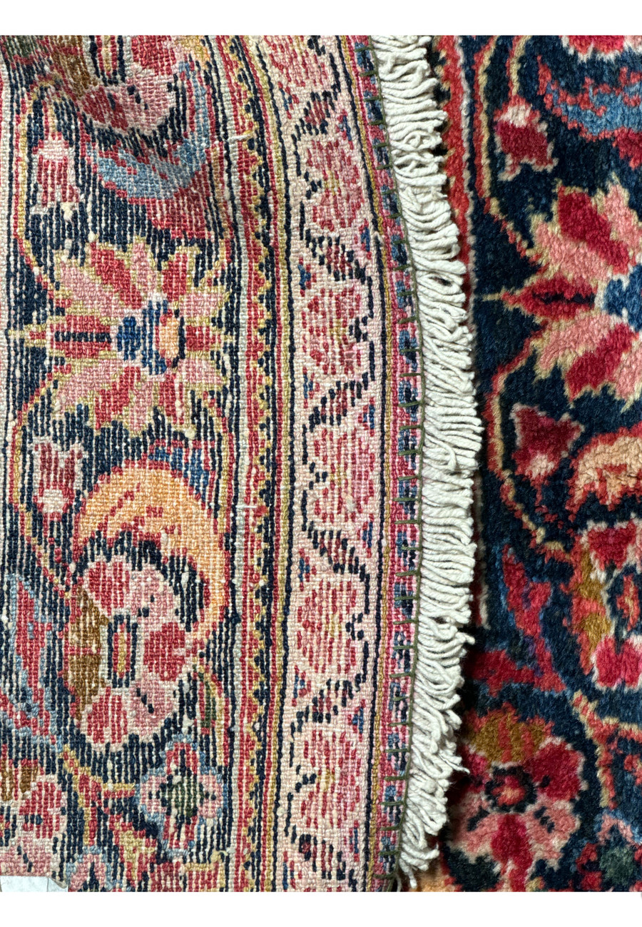 Close-up of the fringe of a 4x6 Antique Persian Lilihan Rug, showing the immaculate condition of the weave.