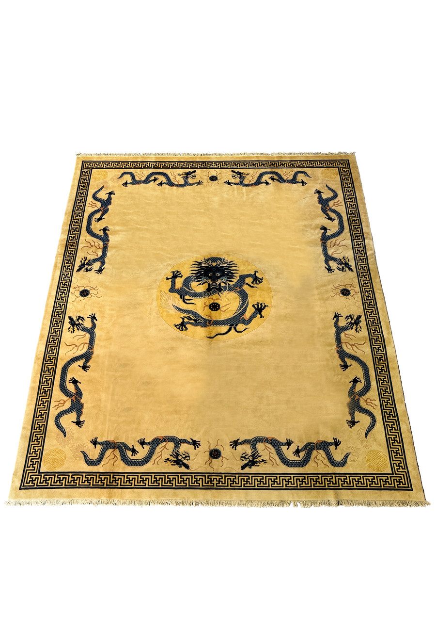Full display of a handmade Chinese Dragon Rug with beige field and contrasting blue border design