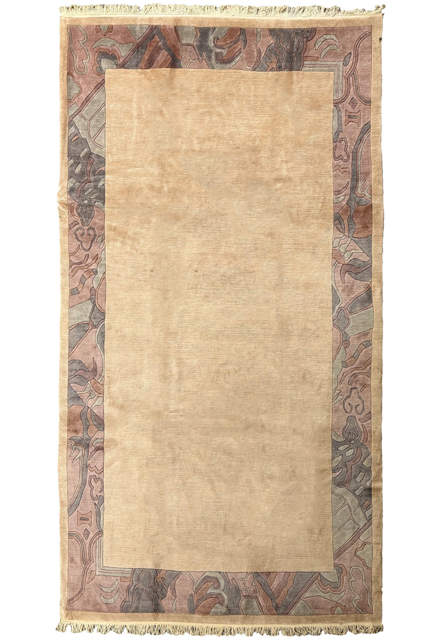 Top-down view of a 7x13 Modern Royal Tibetan beige rug with detailed patterned border.