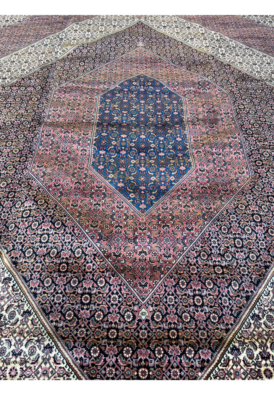 An exquisite Bijar Persian carpet, meticulously woven to showcase a central medallion adorned with an array of detailed symbols and patterns, reflecting the rug's traditional craftsmanship