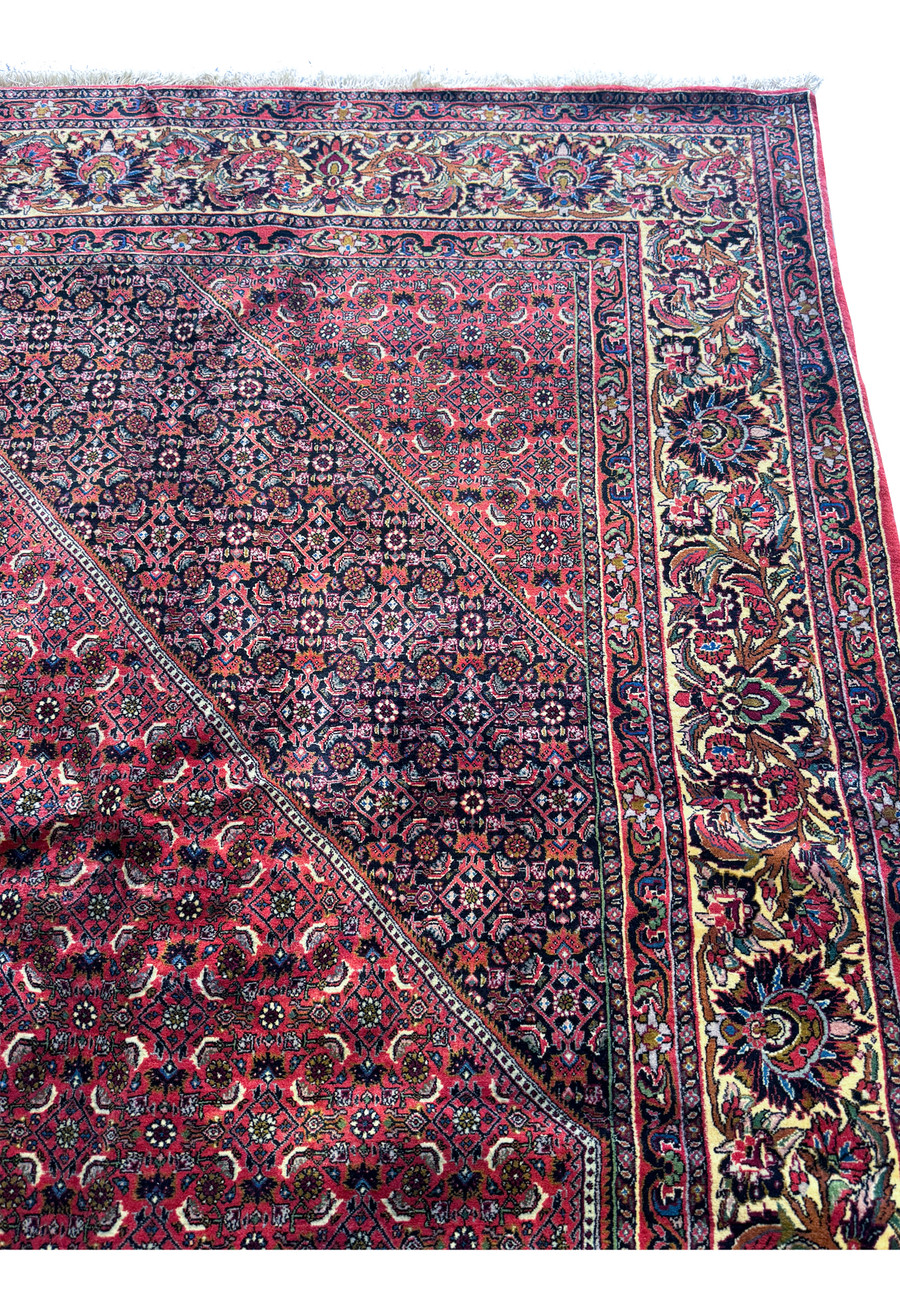Detailed shot of the Persian Bijar Rug’s edge, showing the precision of the weave and the clean finish of the border