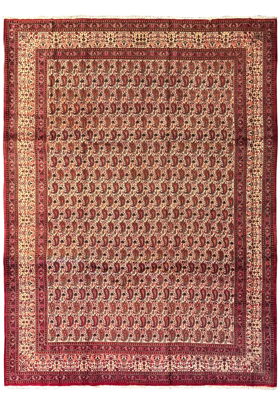 Full view of a 10x14 Persian Moud Rug on a flat surface, highlighting the symmetrical arrangement of traditional motifs and the harmonious blend of colors in the dense pattern work.