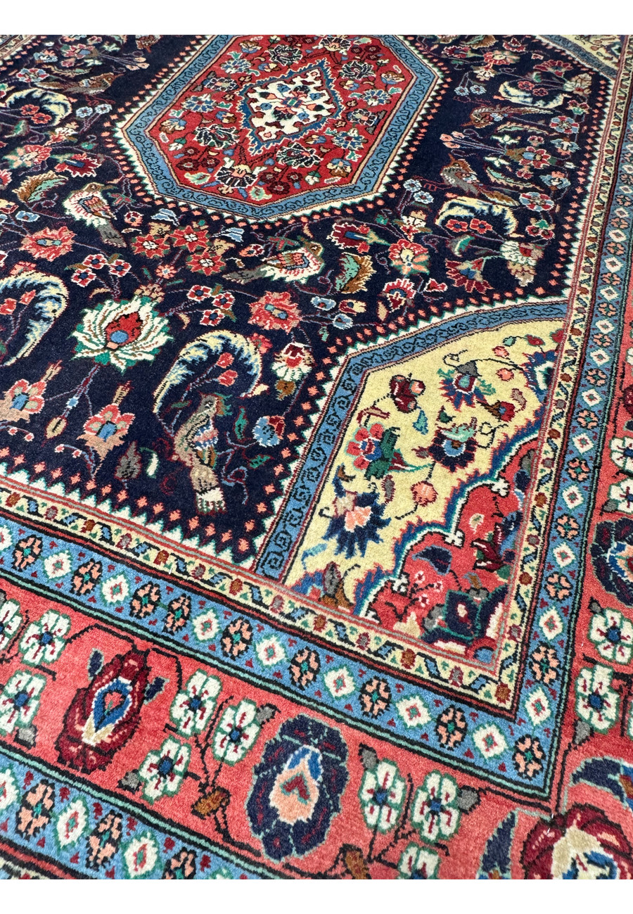 Perspective shot of the Persian Bidjar Rug, highlighting the texture and intricate patterns woven into the dense wool.