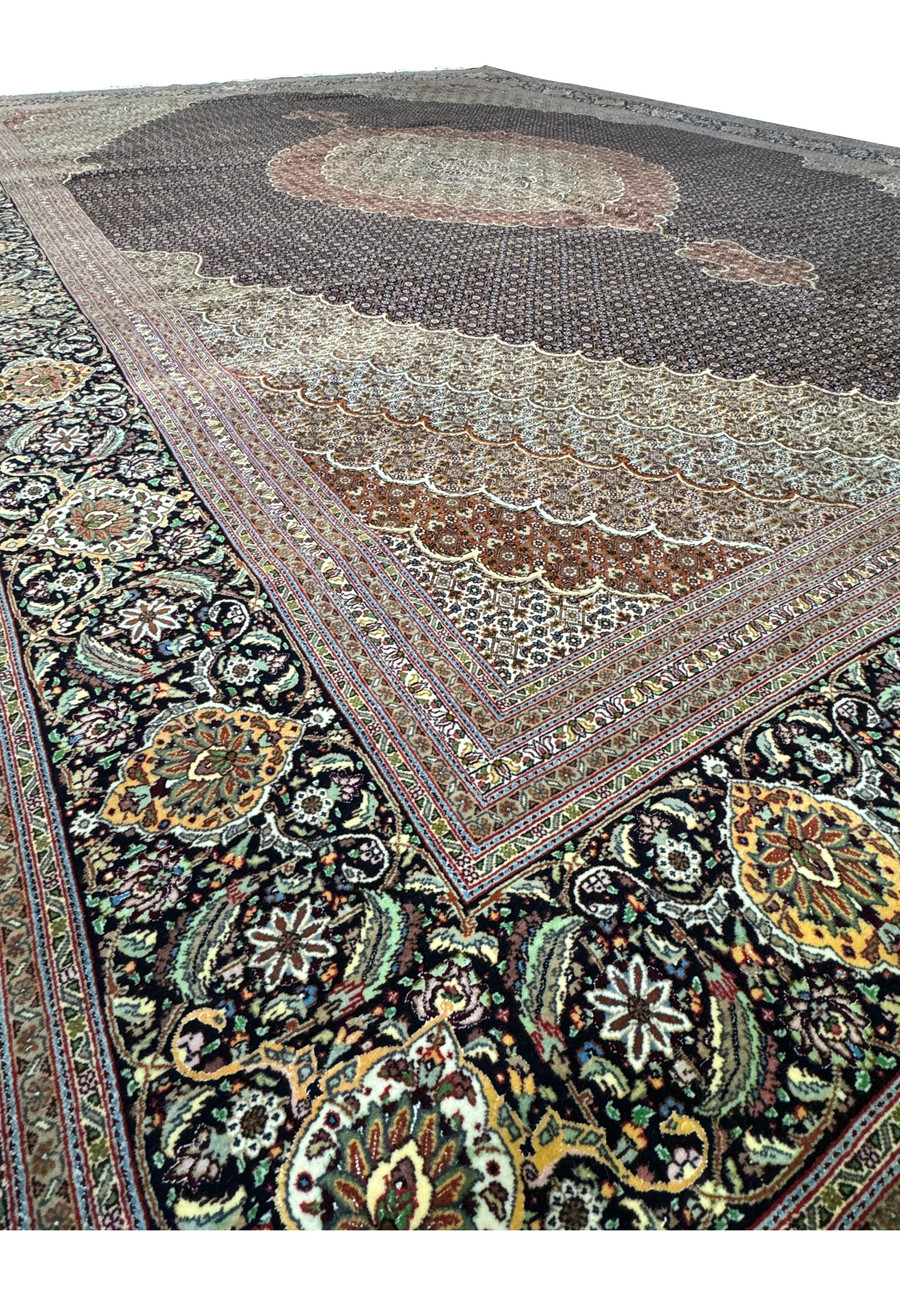 Detailed close-up of the 11'7 x 16'6 Persian Tabriz Mahi rug, highlighting the geometric and floral patterns in wool and silk