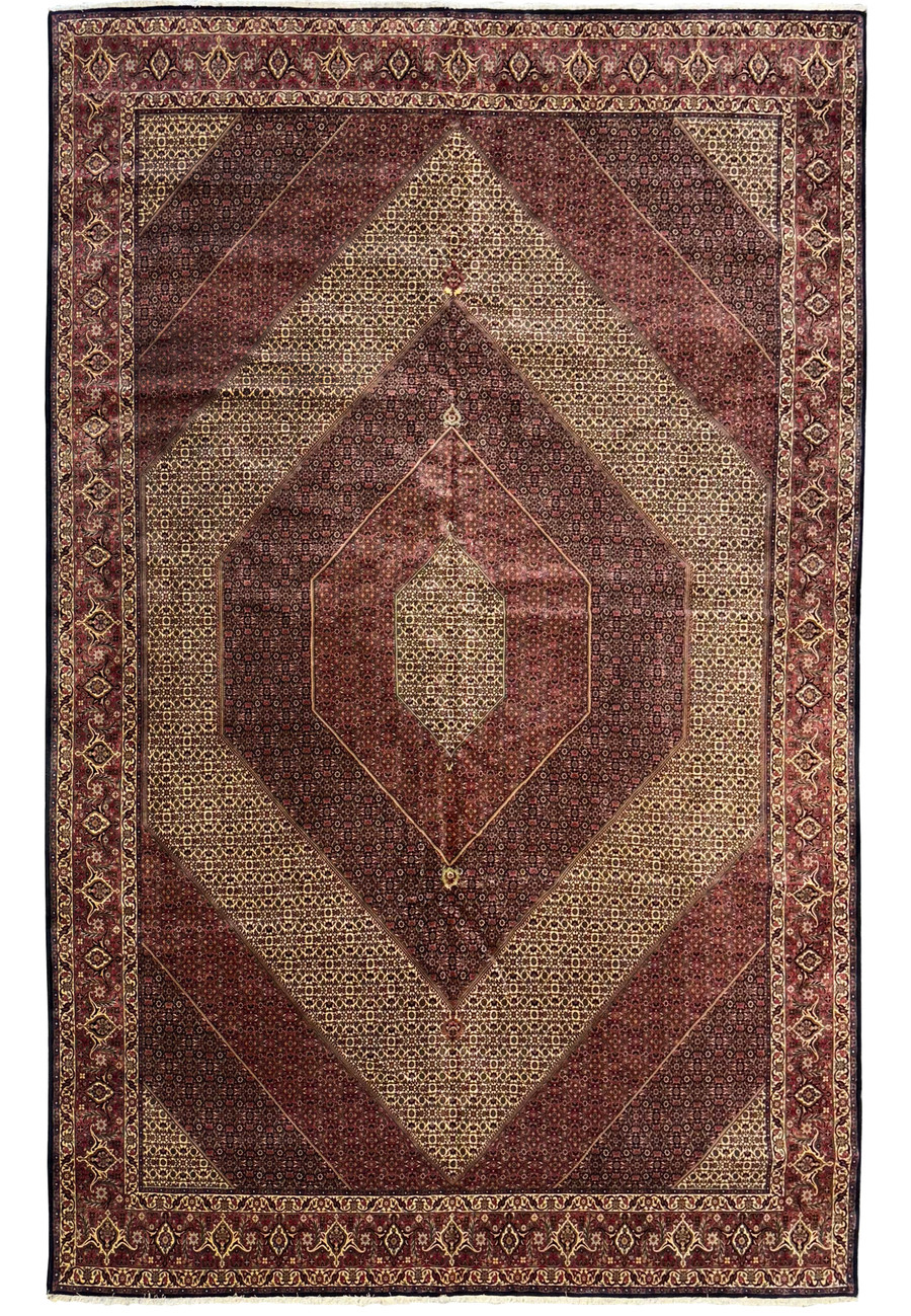 Top view of a 13x19'7 Persian Bijar Rug with intricate medallion and floral patterns in red, brown, gold, and yellow colors
