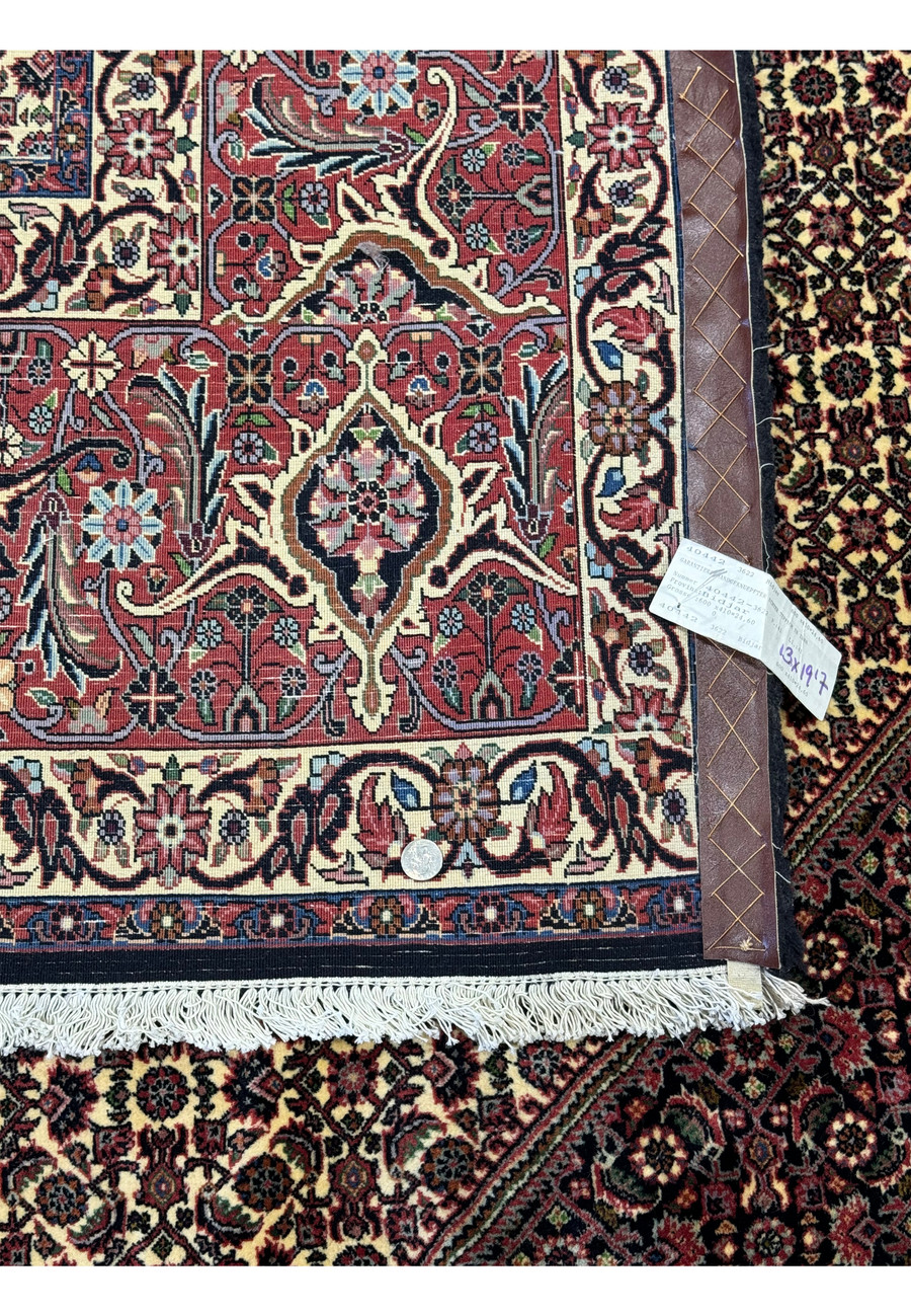 Corner view of the Persian Bijar Rug's back, featuring a tag and intricate pattern, demonstrating the rug's detailed craftsmanship.