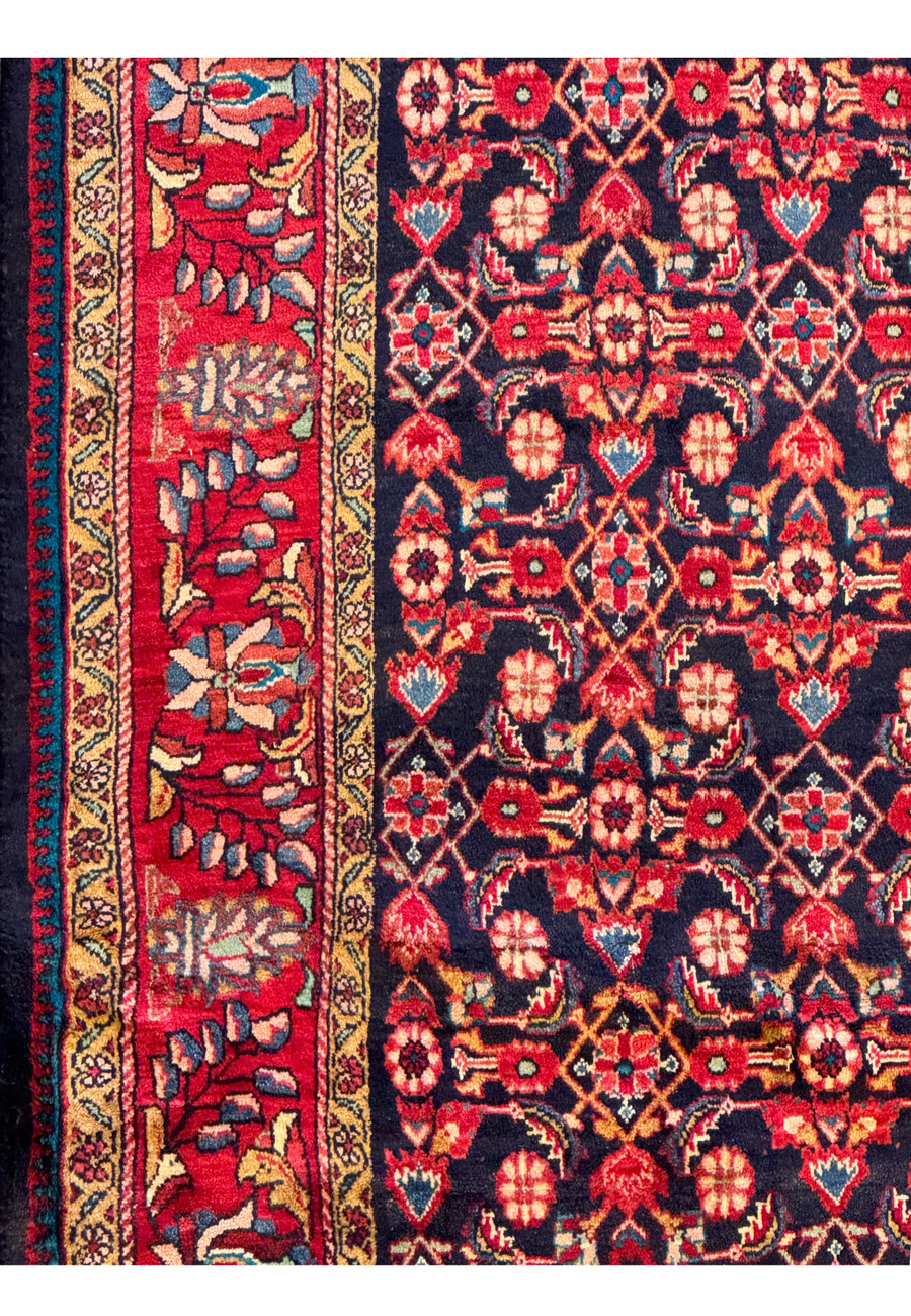 Side view of the Persian Mahal rug, showcasing the vibrant colors and detailed patterns.