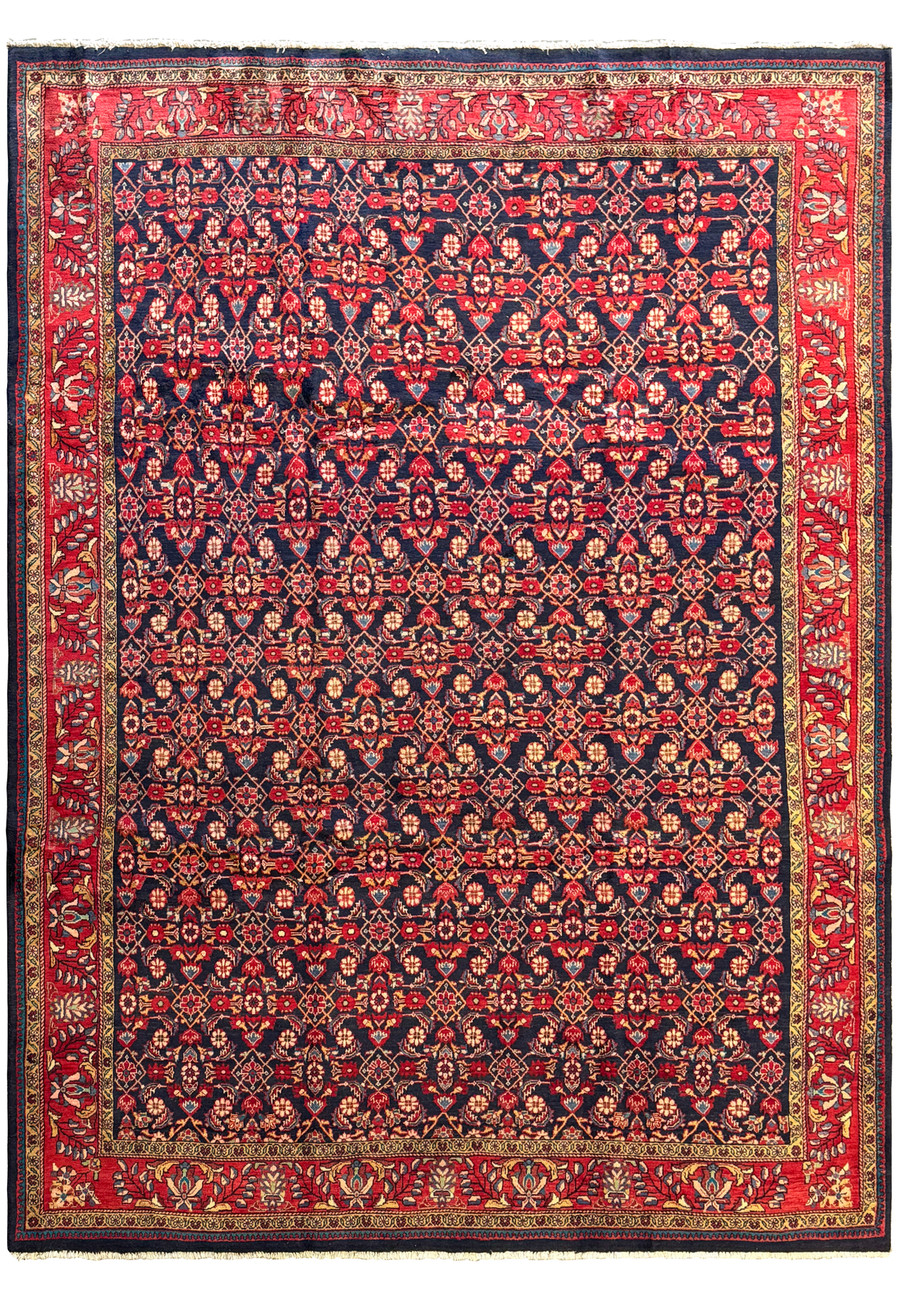 9' x 12'5" Persian Mahal rug with navy blue, red, cream, and golden yellow colors, featuring intricate floral and geometric patterns.