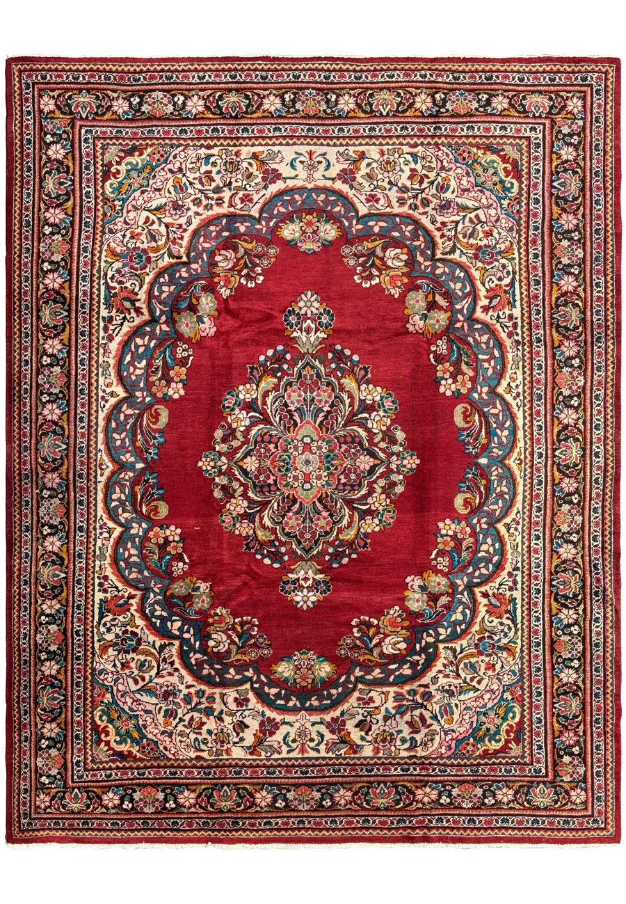 Top view of a 10'7 x 13'5 distressed Persian Mahal rug showcasing its intricate medallion and floral motifs.