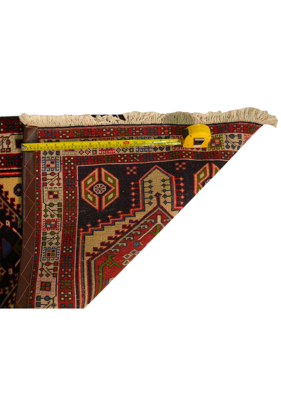 Close-up of measuring tape on 2'7 x 9'6 Persian Yalameh Runner Rug - Highlighting precise dimensions and weave