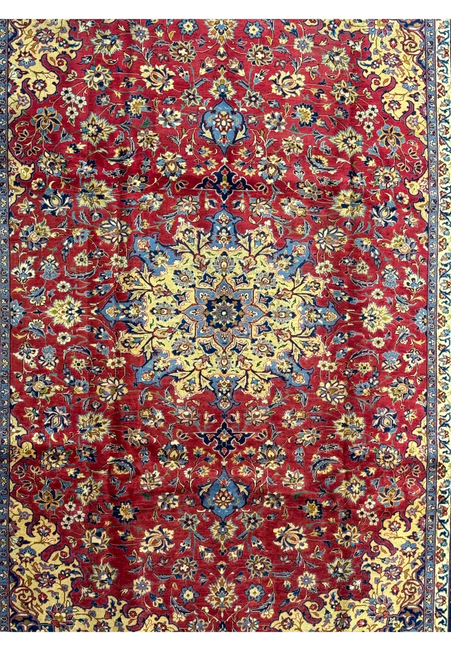 Close-up of central medallion on 10'2 x 13'6 Persian Isfahan Rug displaying intricate craftsmanship.