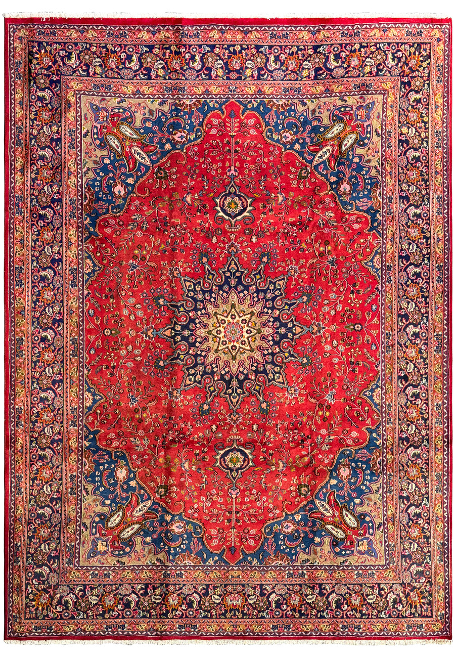 Overhead view of a 10 x 12'4 Persian Mashad rug showcasing its intricate central medallion and vibrant red field.