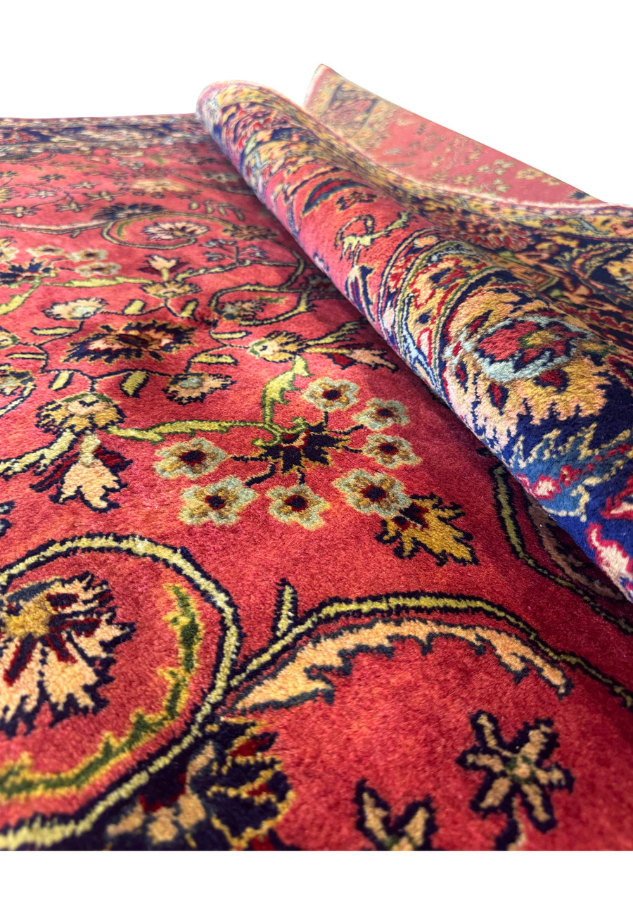 Rolled up to highlight the softness of this American Saruk Rug