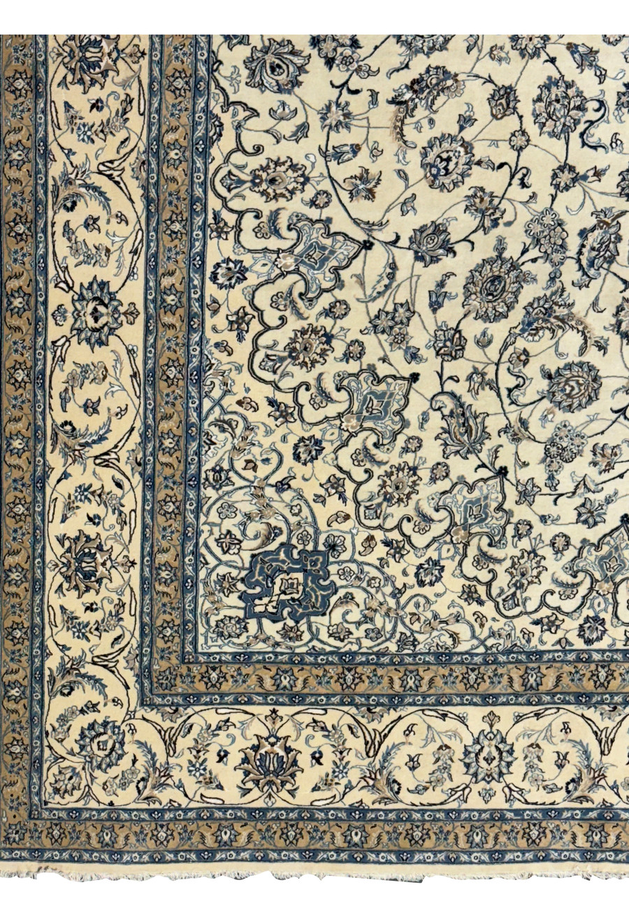 Elegant border designs with floral motifs on a Persian Nain 9LA Wool & Silk Rug