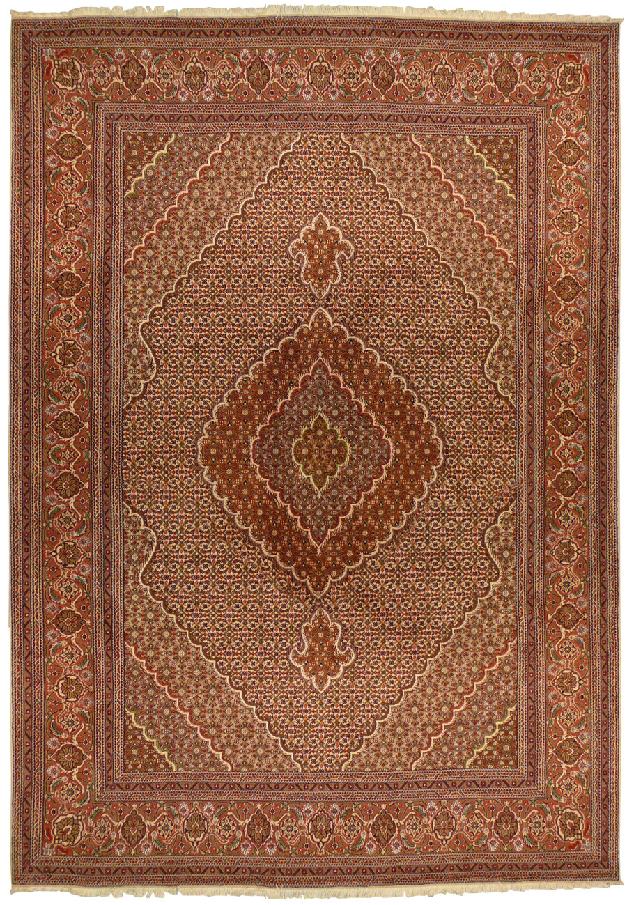 Full view of the 6'8 x 9'9 Persian Tabriz Mahi Rug laid flat on the floor showing the entire design.