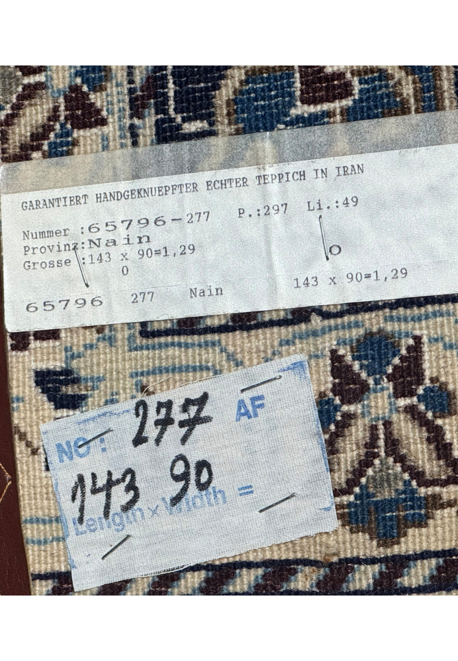 Backside tag of 3 x 4'9 Nain Persian Rug with detailed information.