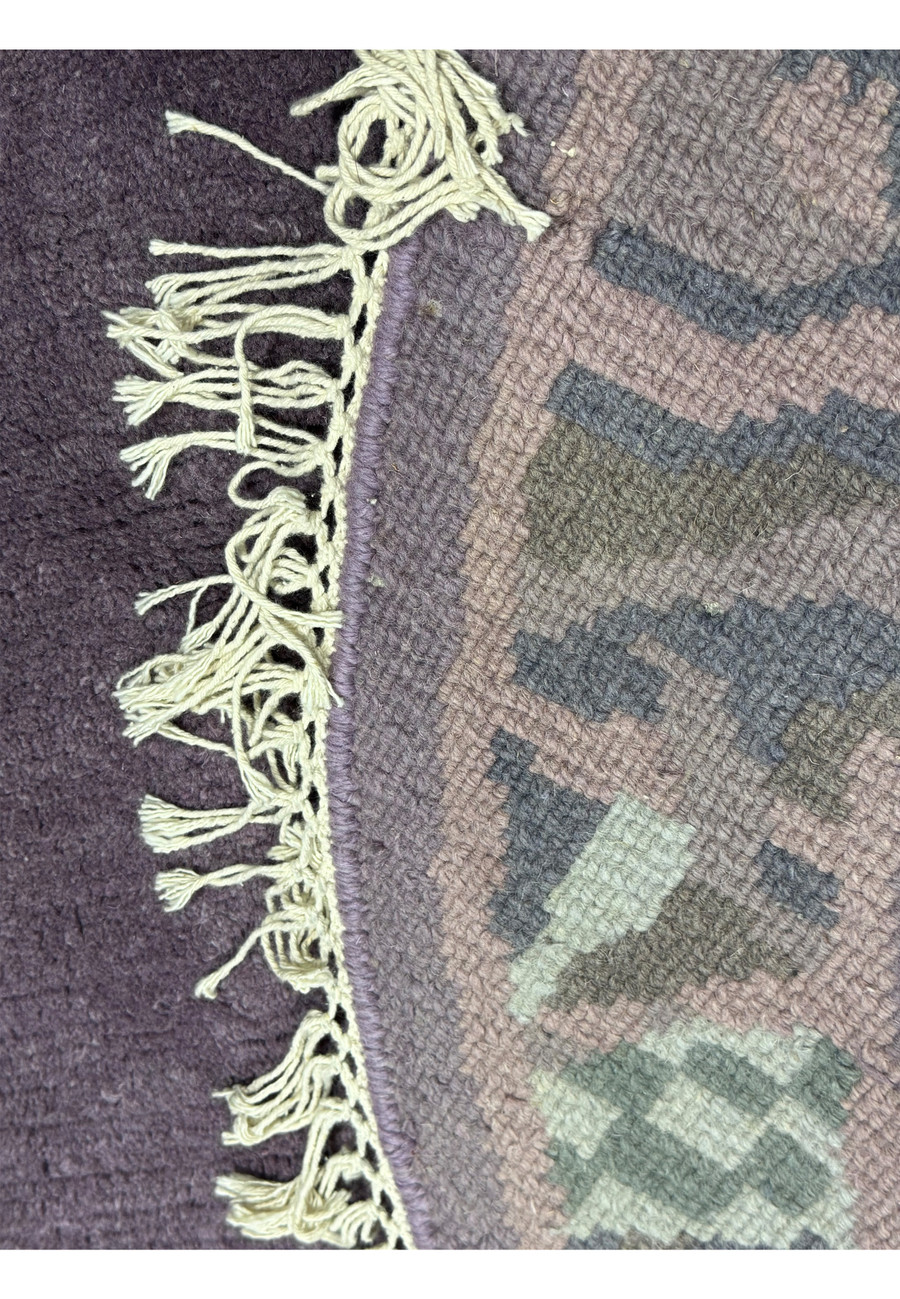 Backside of the 4'8 x 4'8 handmade round Nepalese rug, displaying the high-quality handmade construction.