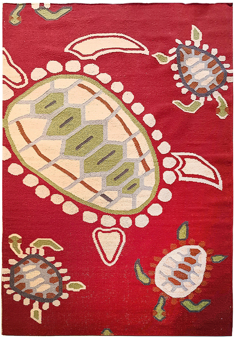 5' x 8' handmade rug with turtle pattern in burgundy.