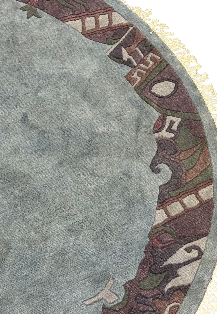 Detailed view of 8x8 Tibet Round Rug border with Tibetan motifs